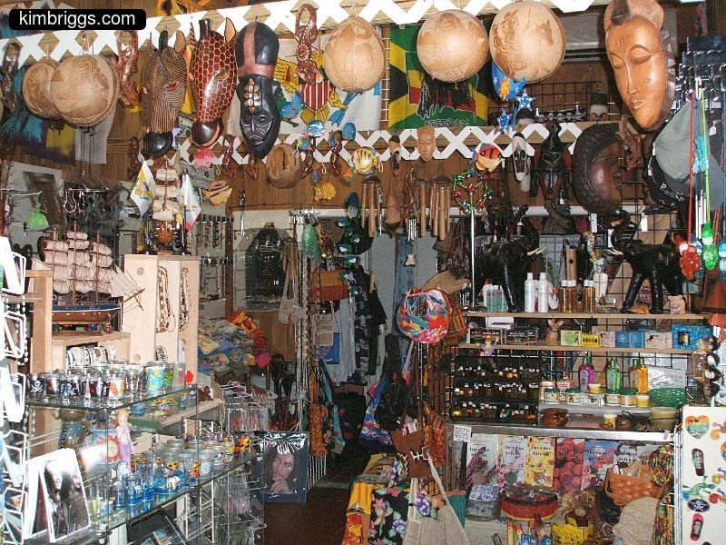 Small shop filled with colorful Caribbean souvenirs.