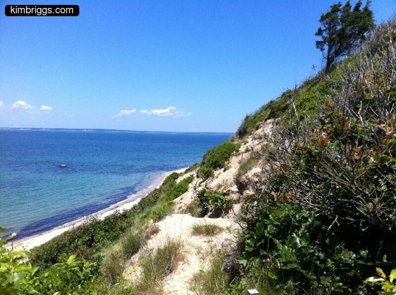 Calm ocean and sandy hill