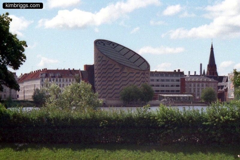 Sliced cylinder building in Copenhagen Denmark.