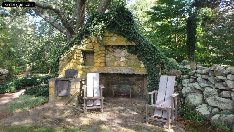 Outdoor stone hearth and wall.