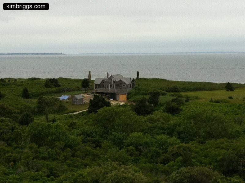 house on grassy shore