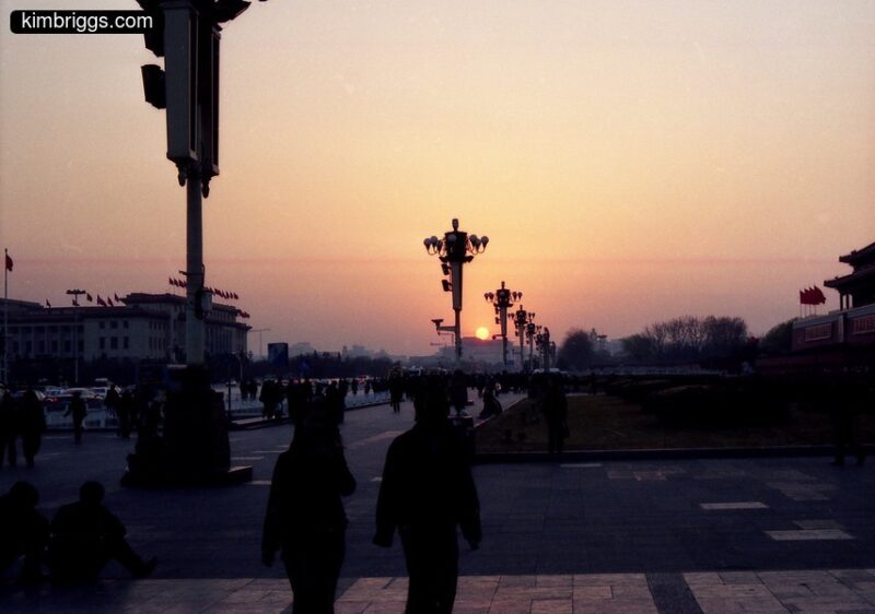 Sun setting over Tienanmen Square.