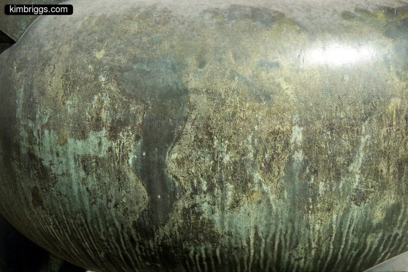 Close-up view of bronze vat.