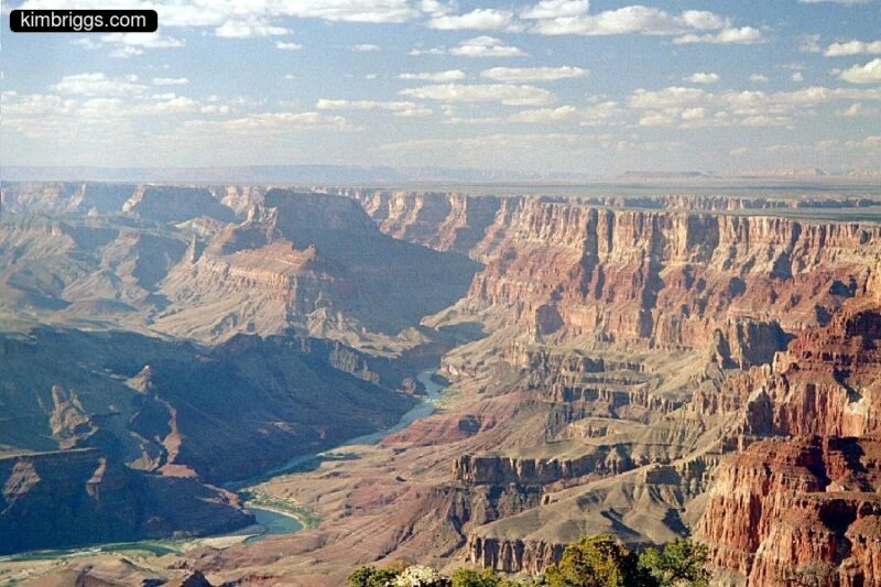 Red and orange layers at Grand Canyon with large shadows.