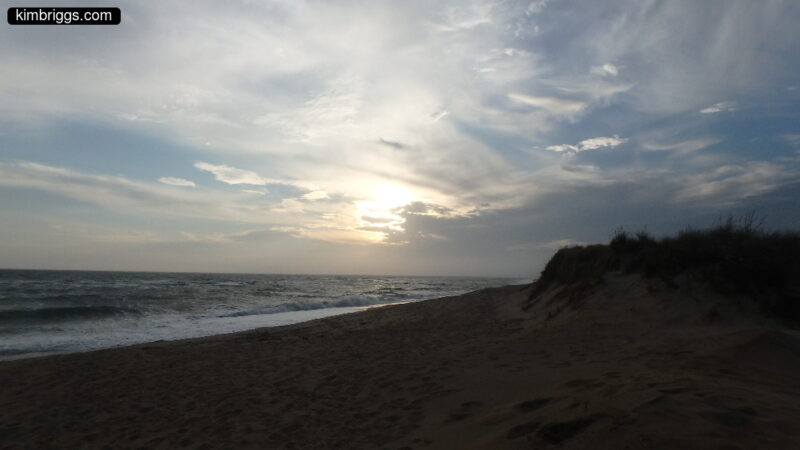 Silhouette of beach at sunset.