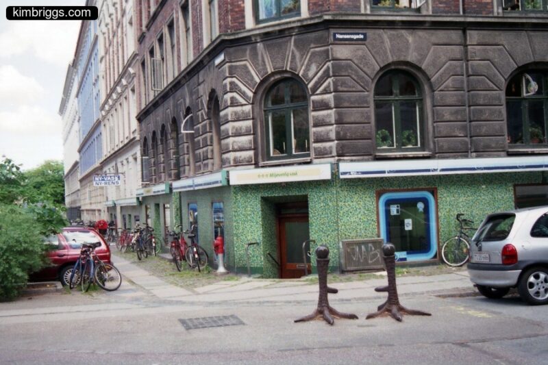 European building block with bike rack outside.
