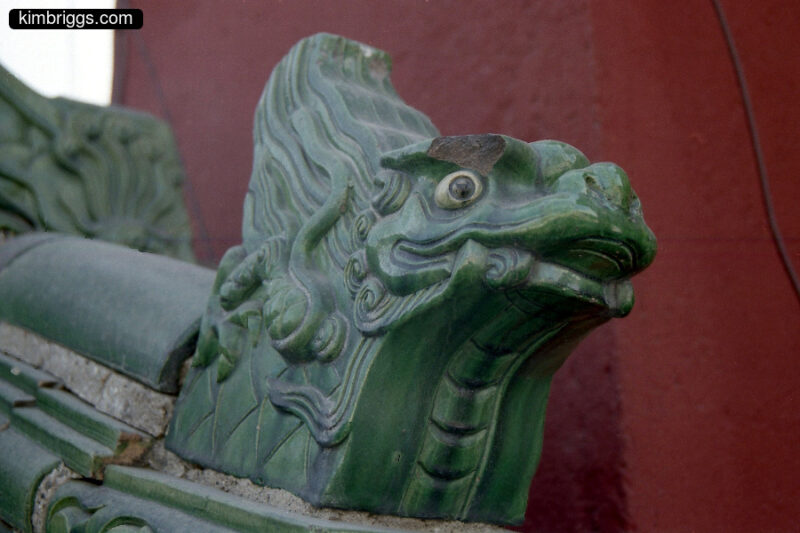 Green ceramic Chinese dragon head.