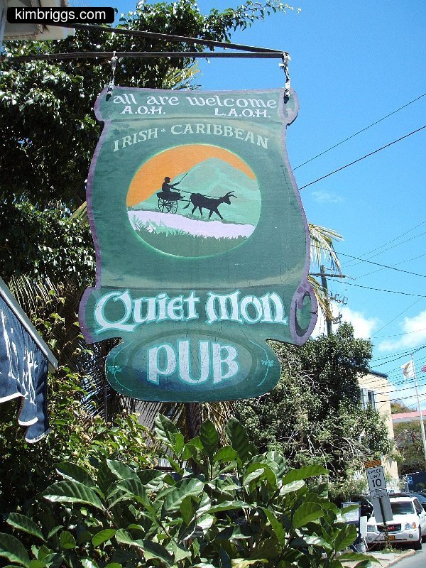 Sign for Quiet Mon irish pub in Cruz Bay St. John.