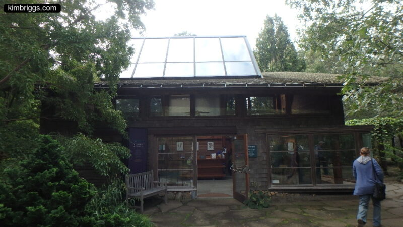 Woman outside Polly Hill visitor's center.