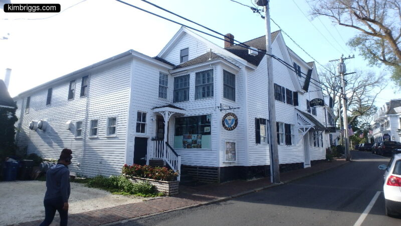 White wooden building with clapboards