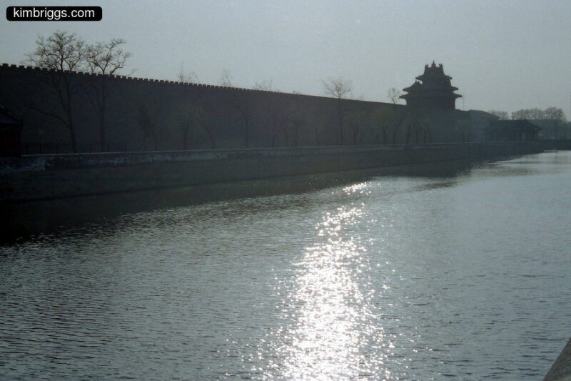 Moat outside Forbidden City at sunset.