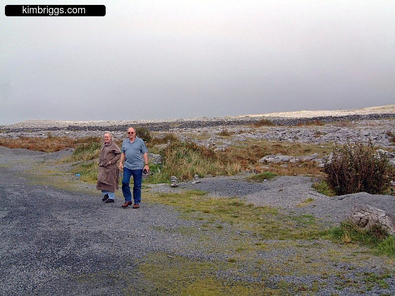 Couple walking in The Burren in Ireland.