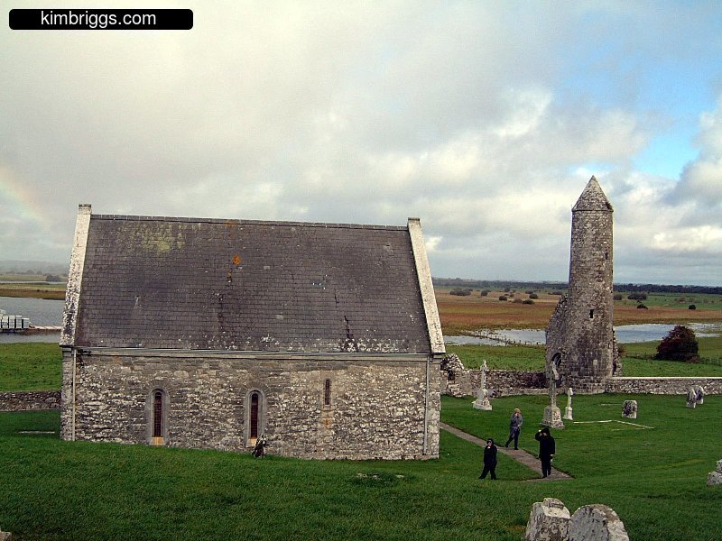 Small stone building and tower in Ireland.