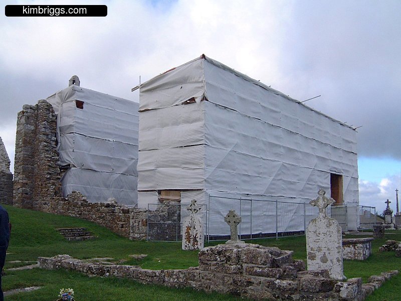 Stone ruins wrapped up during restoration.