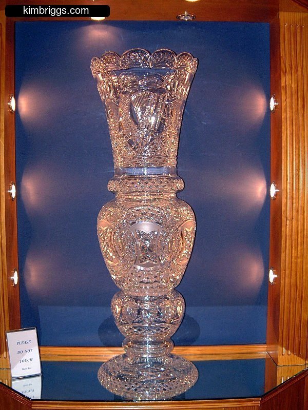 Tall clear crystal vase.