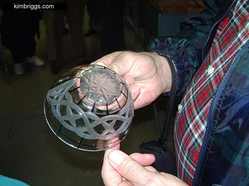 Example of cross-carving on glass crystal.