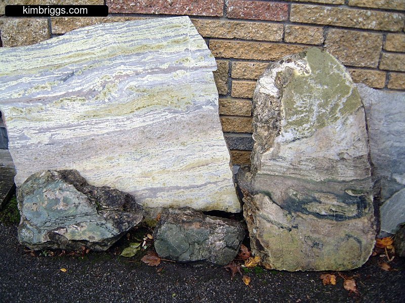 Cuts of Connemara marble white and green.