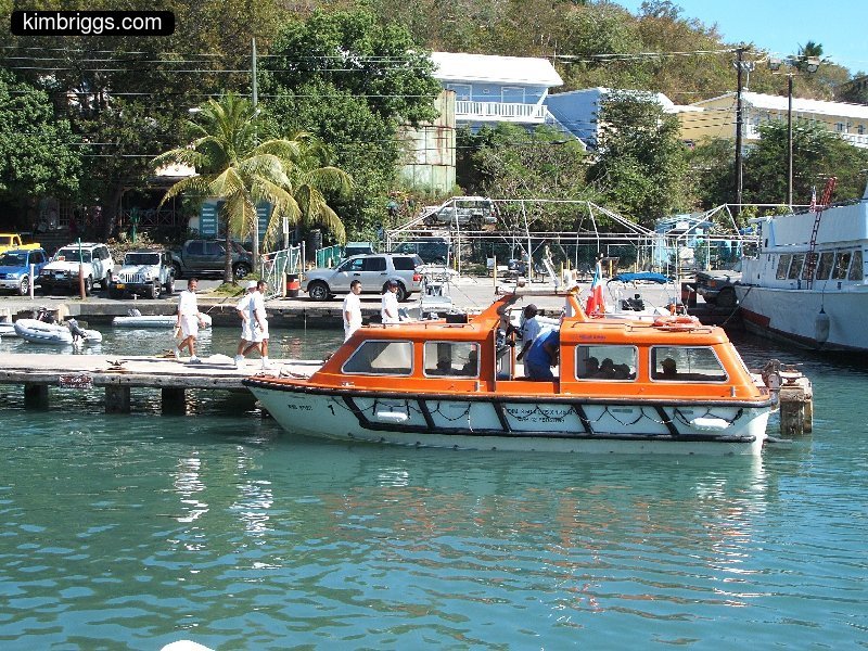 Bright orange water taxi.