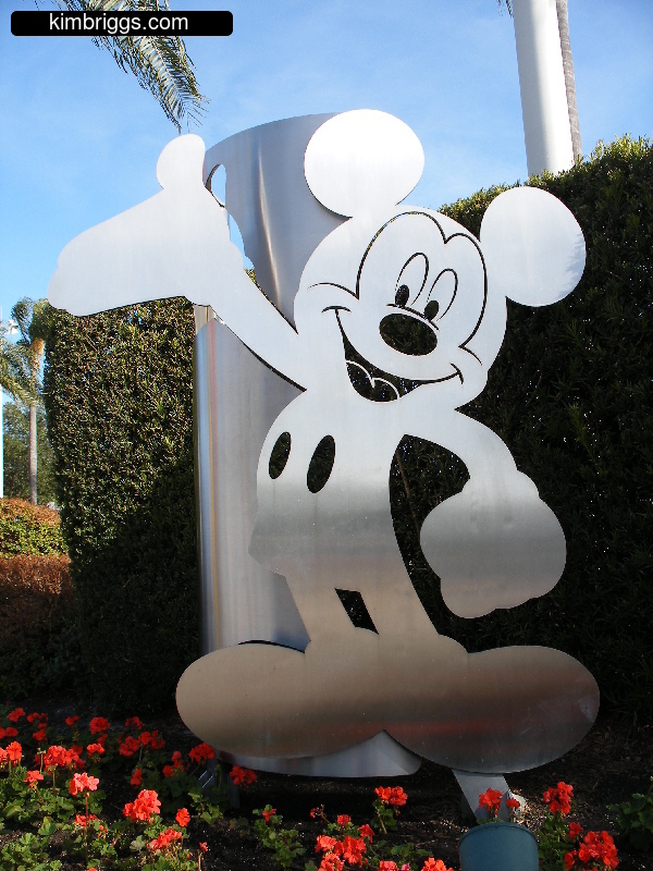 Mickey Mouse metal cut-out sculpture.