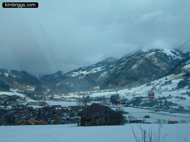 Small Swiss town with gondolas.
