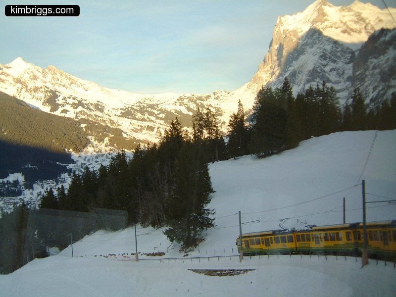 Jungfraujoch cog train rounding a corner.