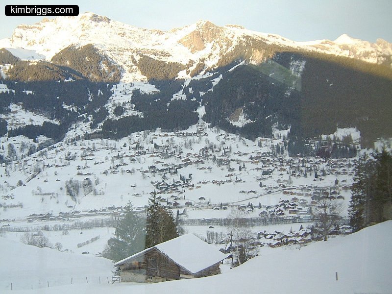 Snow-covered village in Swiss Alps.