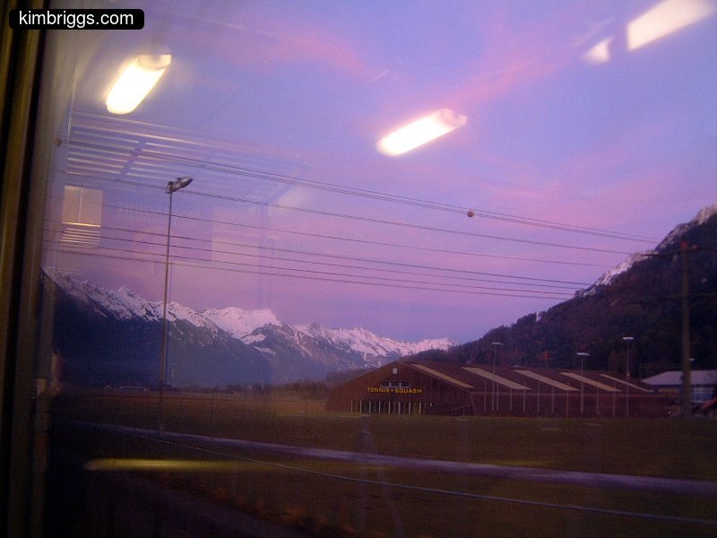 Train window reflection at sunset.