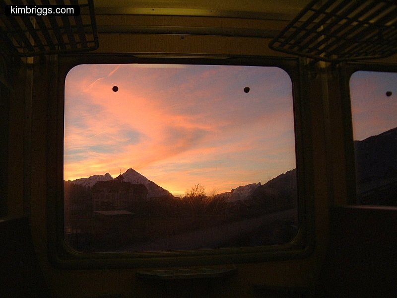 Colorful sunset from train window.