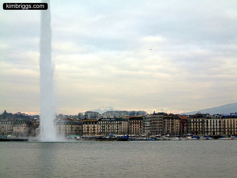 Jet D'Eau with Geneva city background.