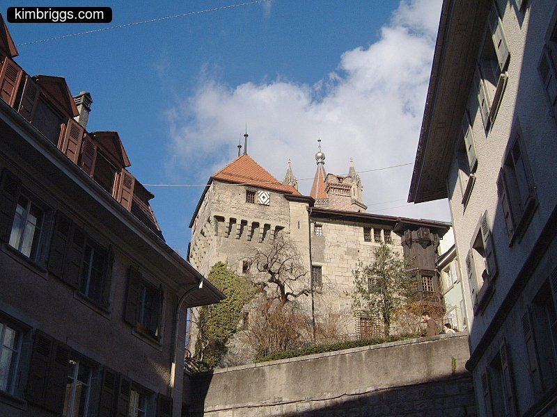 Stone building with turret.