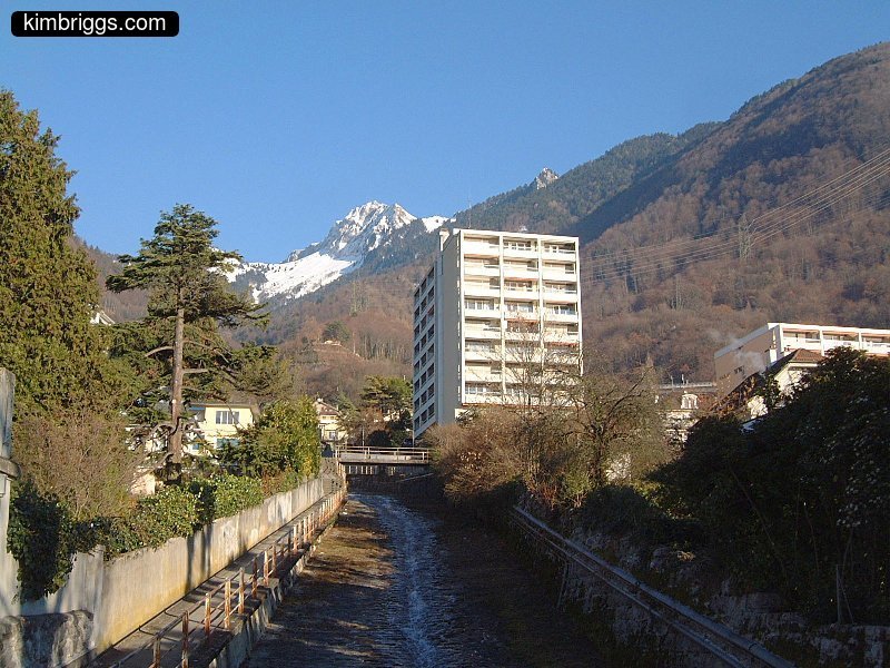 White rectangular apartment building.