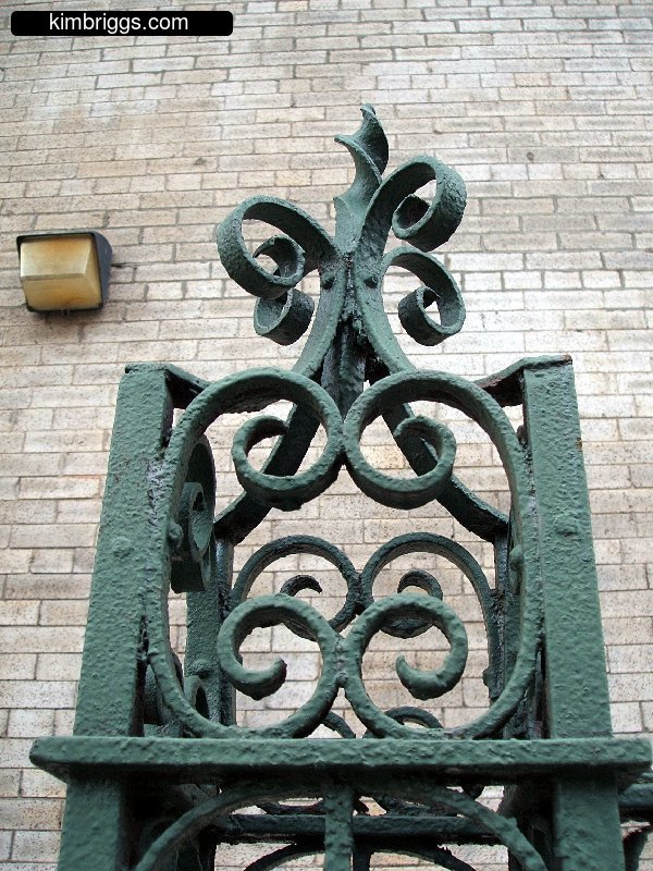 Metal sculpture made of many curved pieces.