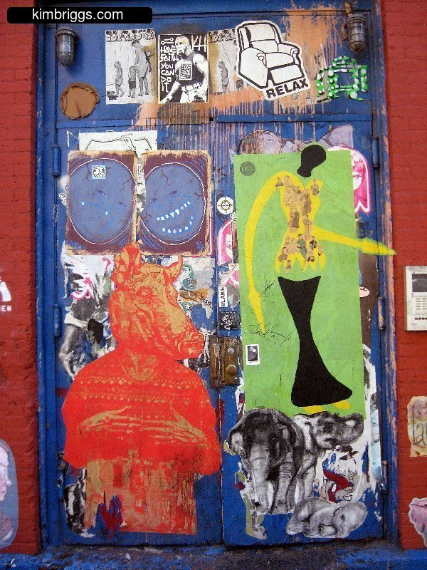Random art and collage on downtown NYC doorway.