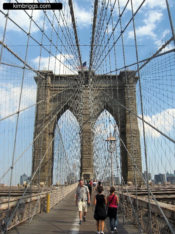 Stone arches of Brooklyn Bridge.
