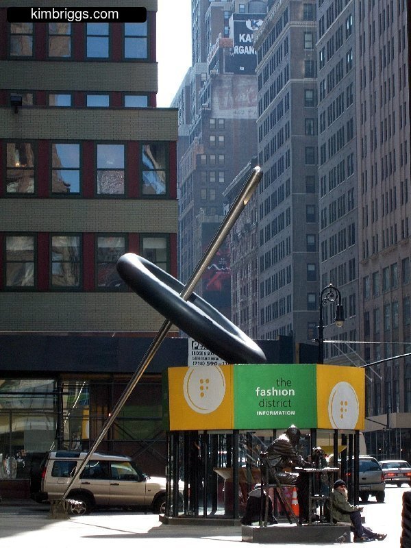 The original Needle Threading A Button sculpture in NYC Garment District.