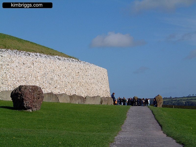 Visitors at Newgrange showing size of structure.