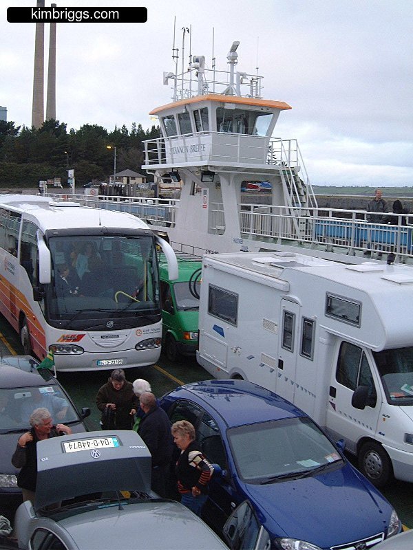Cars, camper, and coach on the Shannon Ferry.