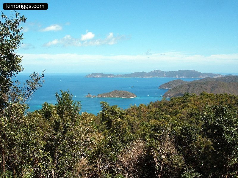 View of tropical island trees, ocean and another ialand.