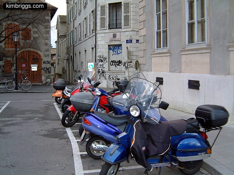Colorful small motor scooters.