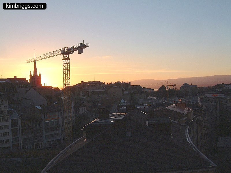 Silhouette of Lausanne at sunset.