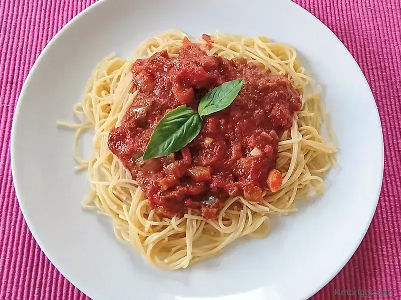 Vegan tomato sauce on pasta.
